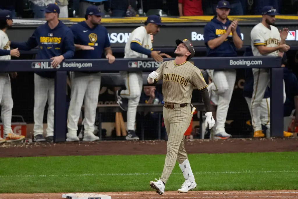 San Diego Padres’ Jackson Merrill reacts after flying out during...