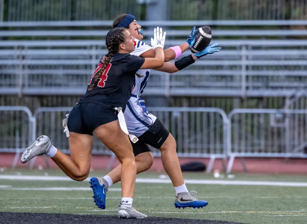 Sierra Canyon wide receiver Angelina Dubois (16), right, makes a...