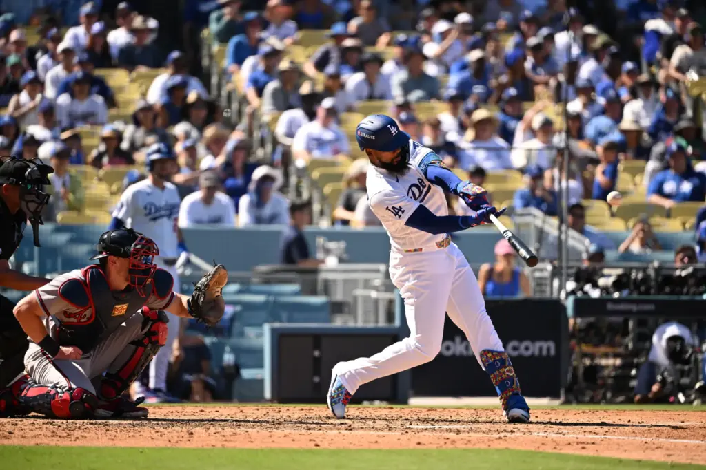 The Dodgers’ Teoscar HernÃ¡ndez hits a two-run home run during...
