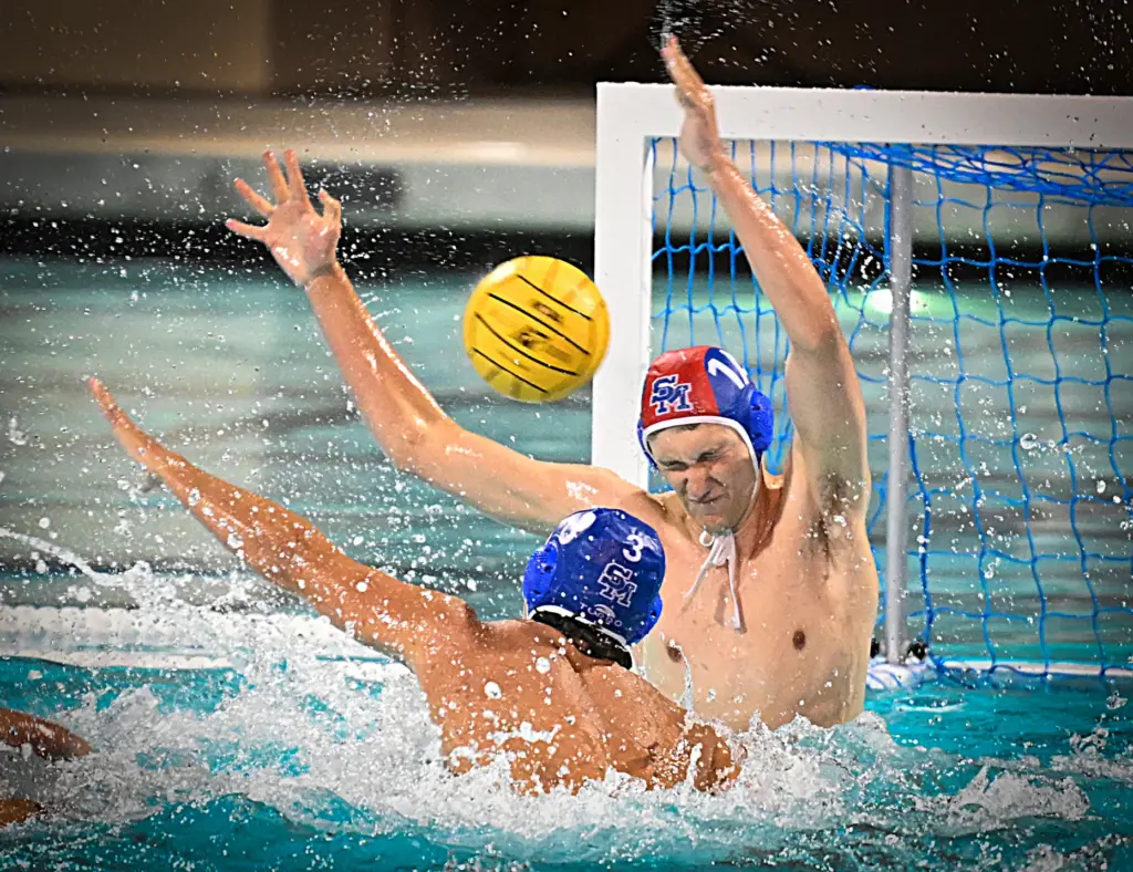 Santa Margaritaâs goalie Oliver Beck, center, tries to block the...