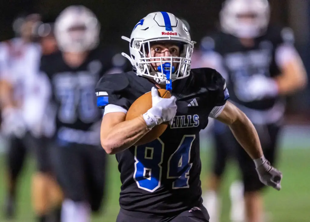 Dana Hills running back Enzo Gallo (84) carries the ball...