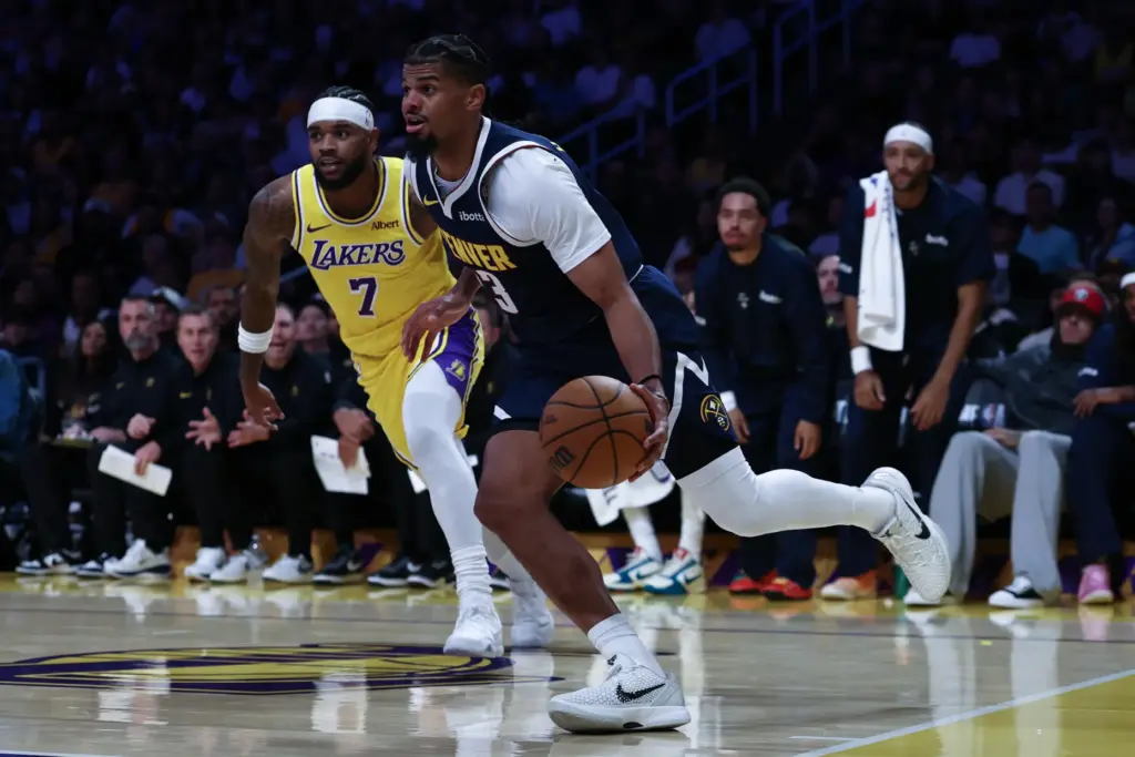 Denver Nuggets forward Marvin Bagley III drives to the basket...