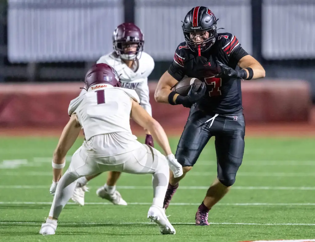 Troy wide receiver Luke Dolmat (7) carries the ball during...