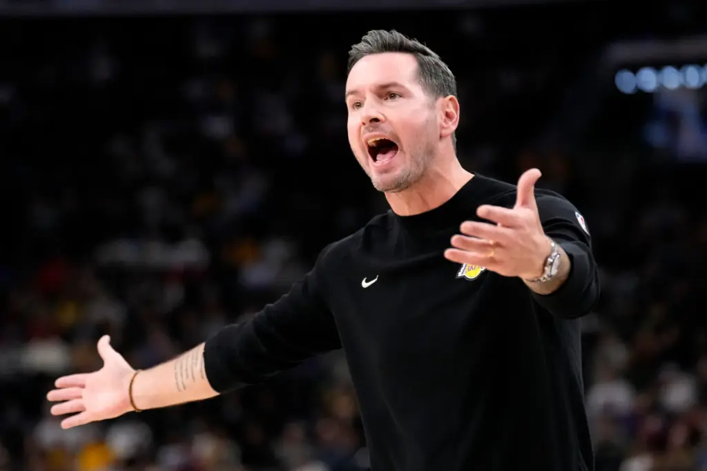 Lakers head coach JJ Redick yells at a referee from...