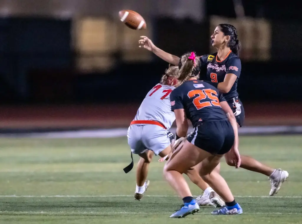 Huntington Beach quarterback Roxie Shaia (9) throws the ball during...