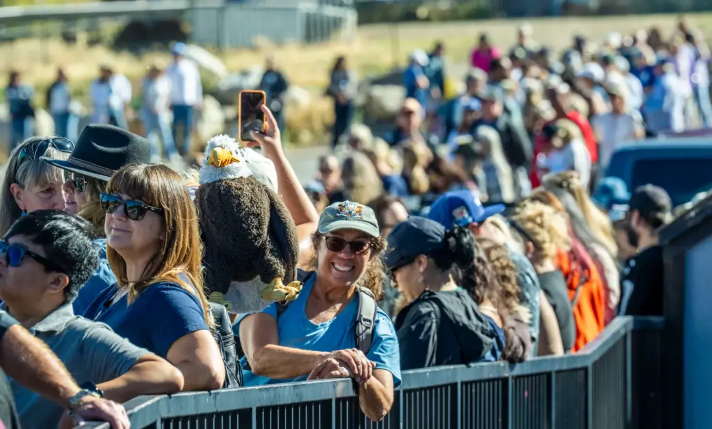 Almost 2,000 people wait in line to attend the celebration...