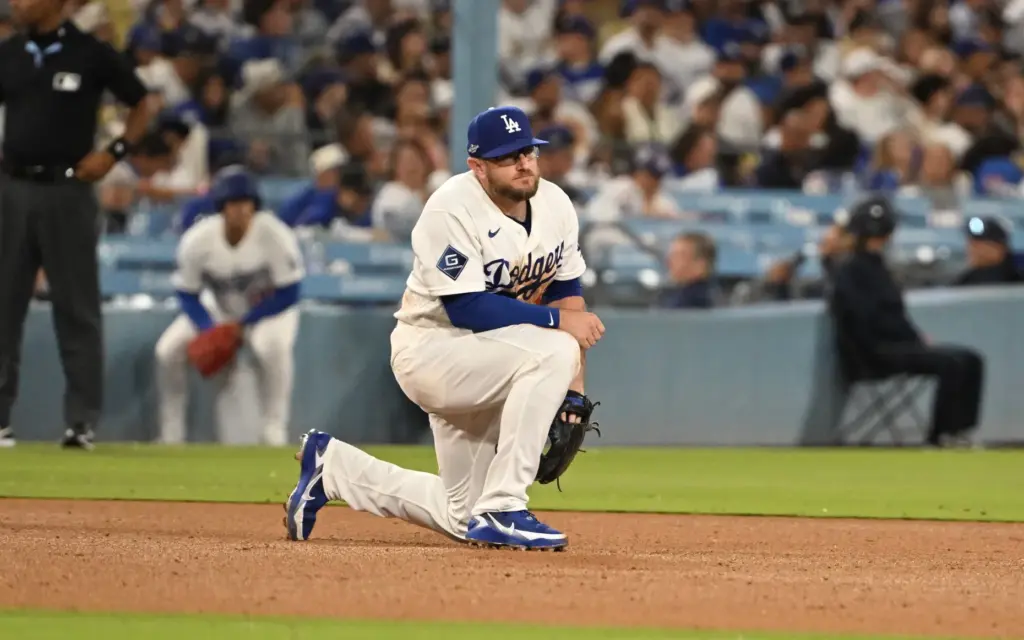 Dodgers third baseman Max Muncy shows his frustration after the...