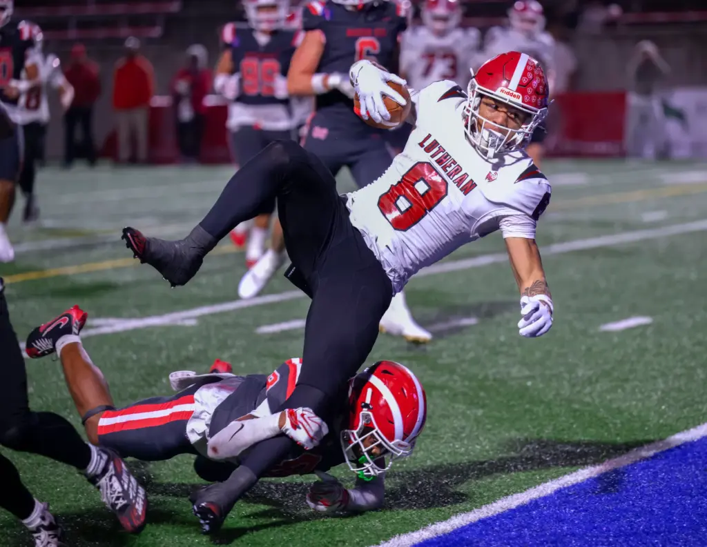 Orange Lutheran wide receiver Nico Bland makes it to the...