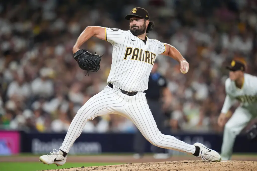 San Diego Padres pitcher Robbie Ray throws to the plate...