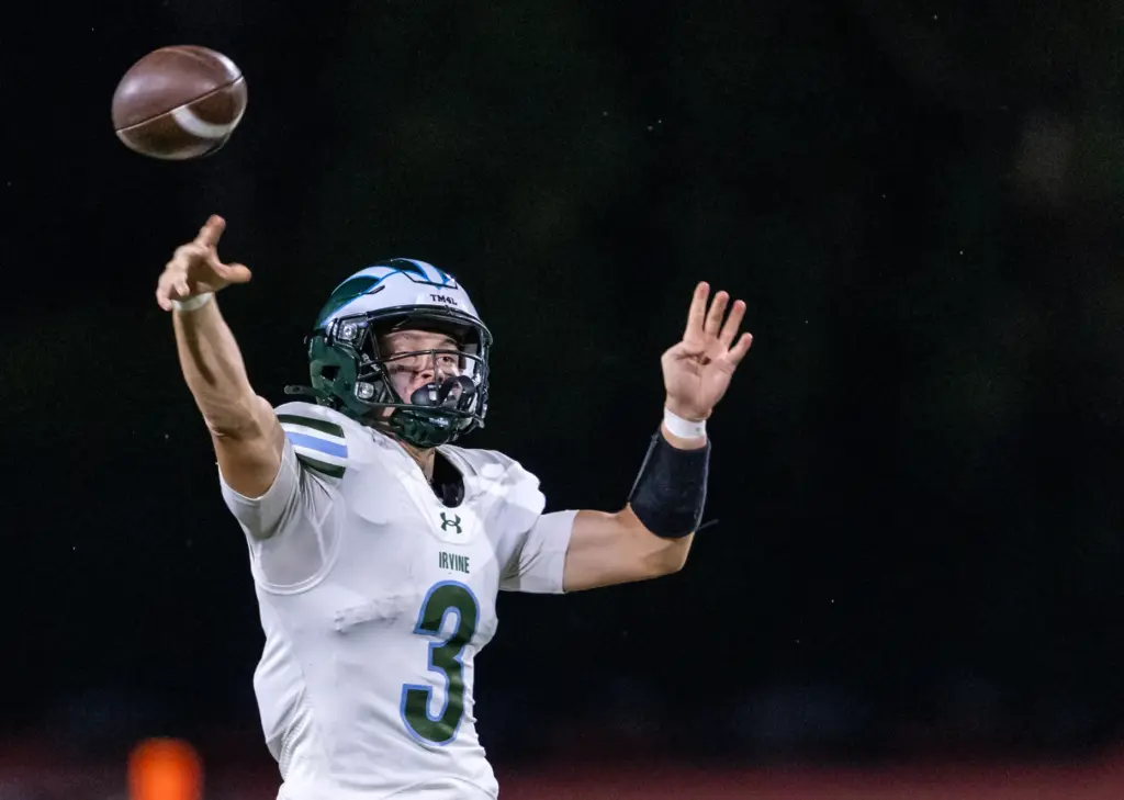 Irvine quarterback Gavin Furr (3) throws the ball during a...