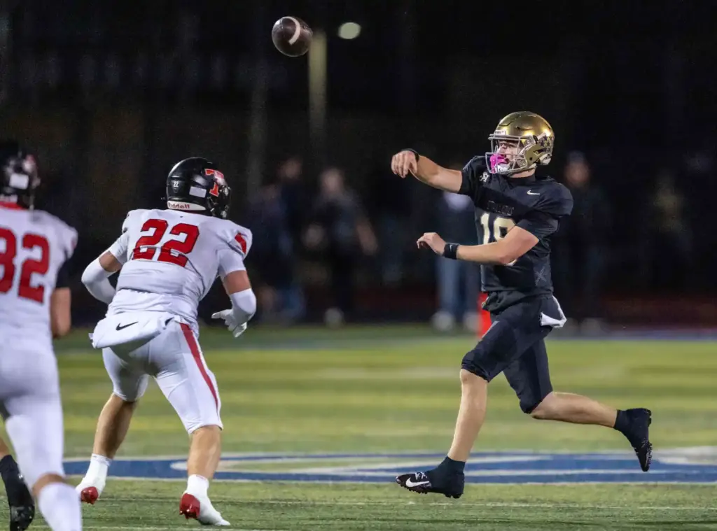 San Juan Hills quarterback Parker Armstrong (18) throws the ball...