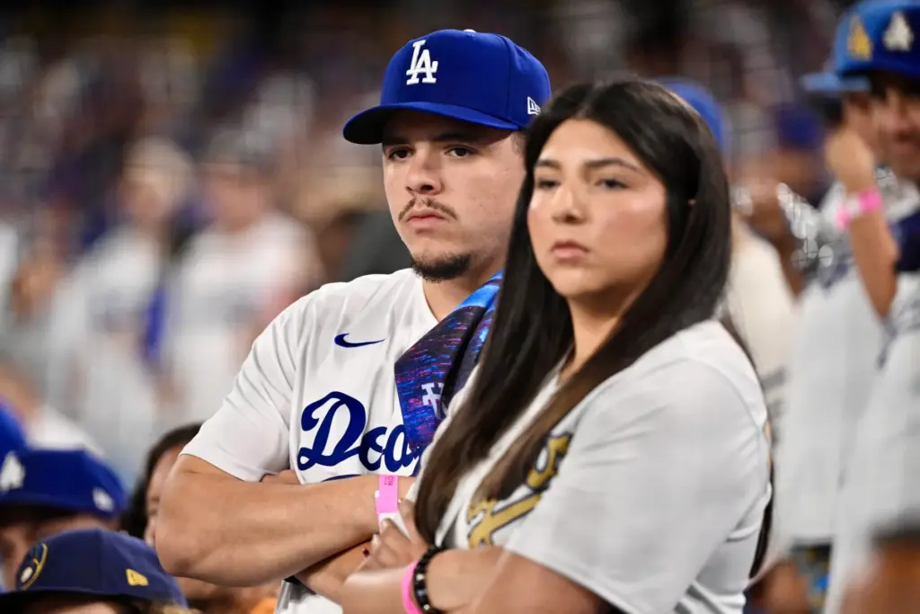 Dodgers fans look on during the ninth inning of Game...