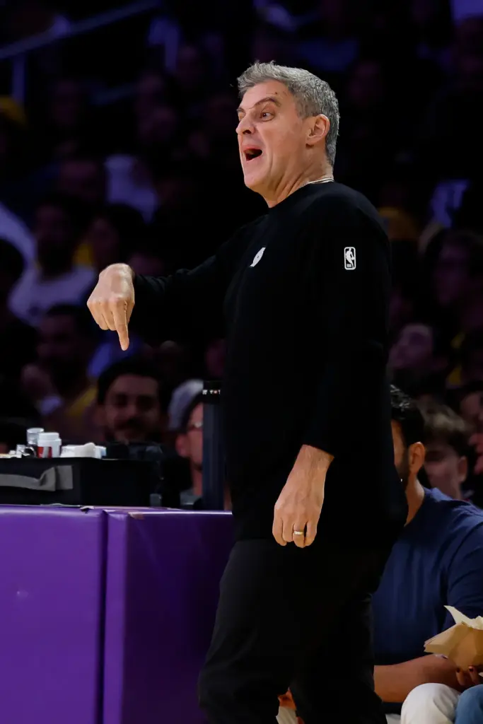 Portland Trail Blazers head coach Micah Nori yells out to...