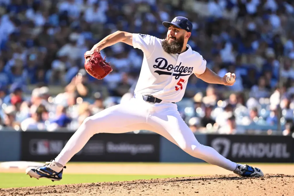 Dodgers relief pitcher Alex Vesia throws to the plate during...