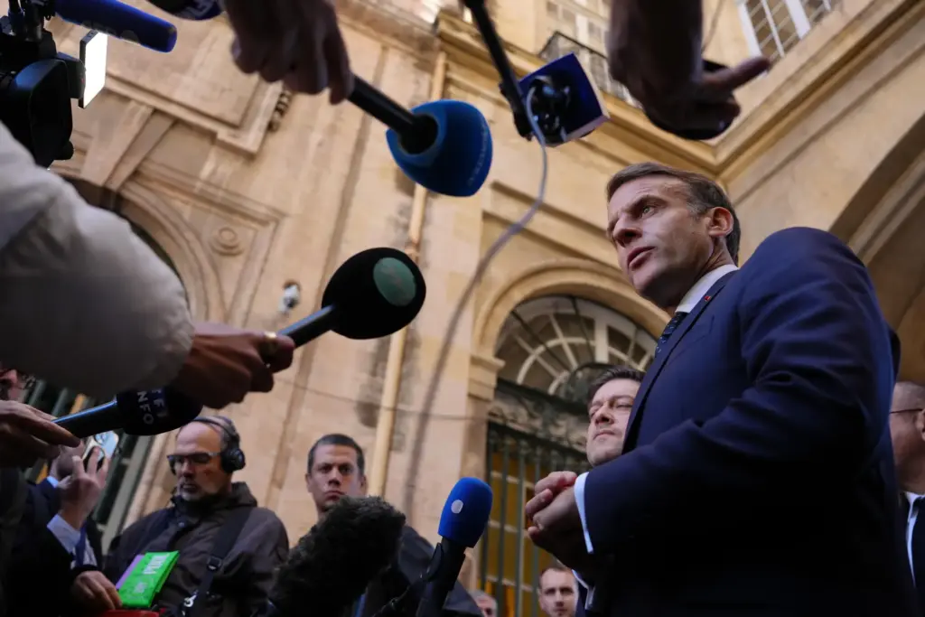 French President Emmanuel Macron addresses the media in Marseille, France,...
