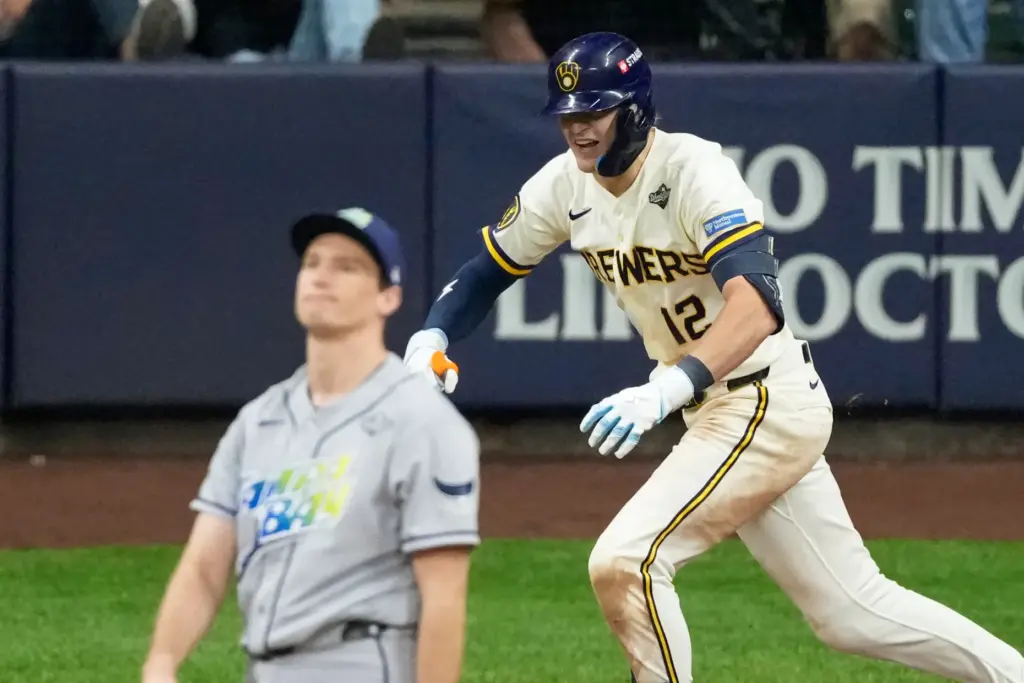 Milwaukee Brewers’ Cooper Pratt celebrates a RBI-single during the seventh...