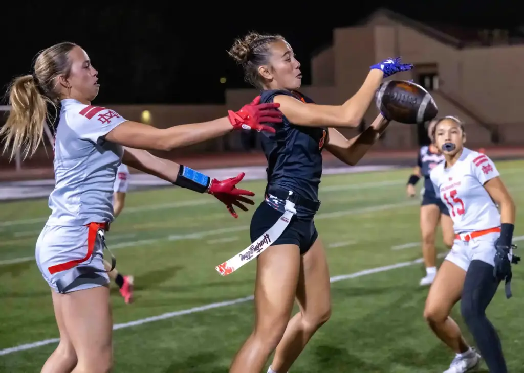 Huntington Beach defensive back Isla Castillo (4) makes an interception...