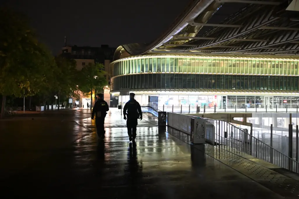 Policemen patrol during an overnight curfew in Paris.