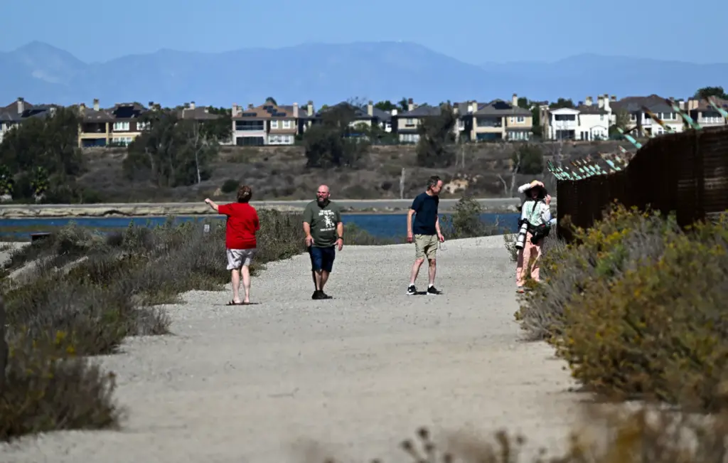Visitors to the Bolsa Chica Wetlands check out the wildlife...