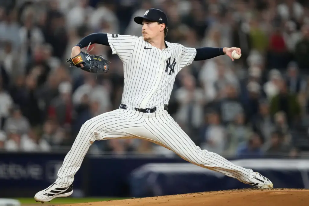 New York Yankees starting pitcher Max Fried throws to the...