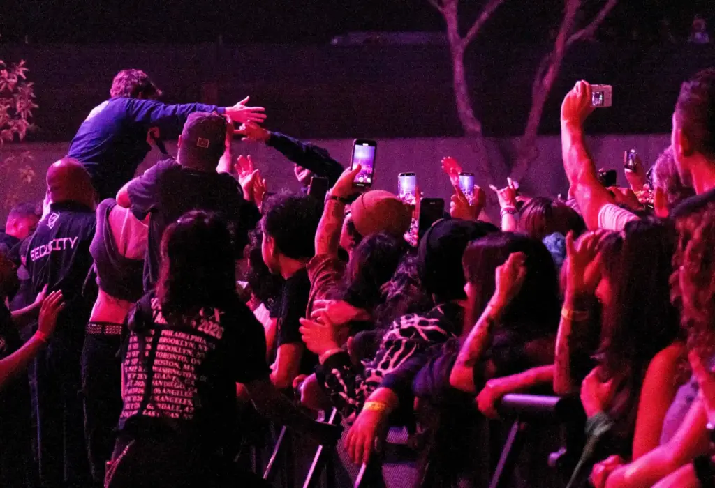 Turnstile vocalist Brendan Yates comes down to the crowd during...