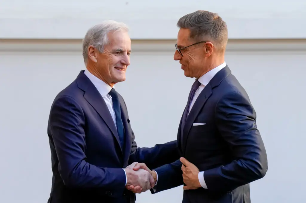 Finnish President Alexander Stubb, left, meets with Norwegian Prime Minister...