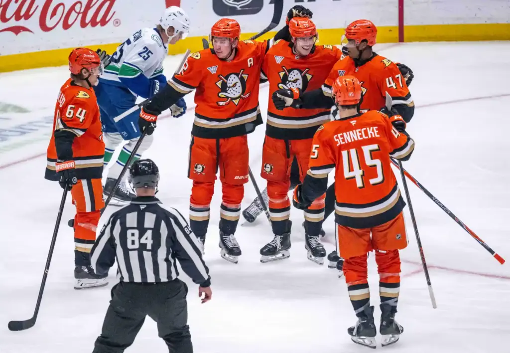 Ducks players celebrate a goal by Jeff Malott (39) during...