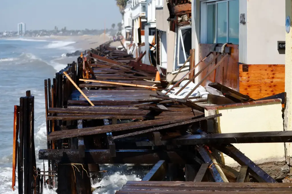 A heavily damaged portion of the Peninsula boardwalk continues to...