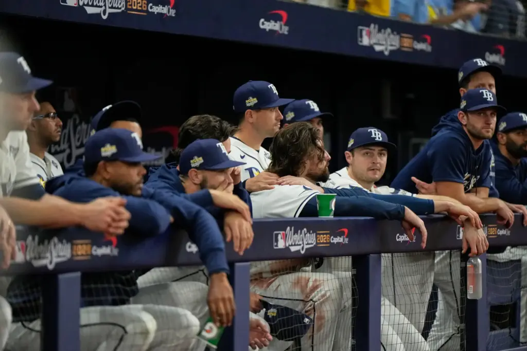 The Tampa Bay Rays watch during the eighth inning of...