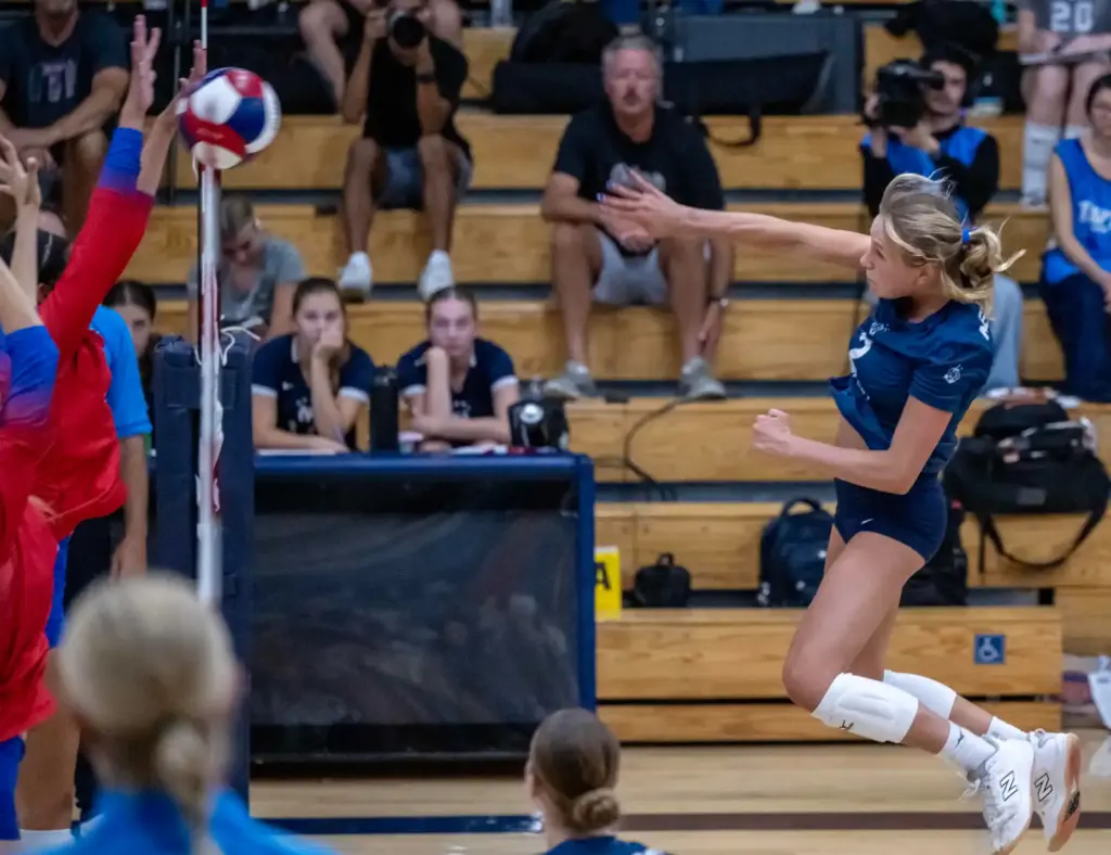 Newport Harbor outside hitter Ella Olson (2) tips the ball...