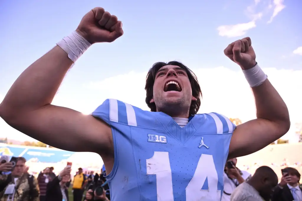 UCLA quarterback Ty Dieffenbach (14) celebrates after the Bruinsâ victory...