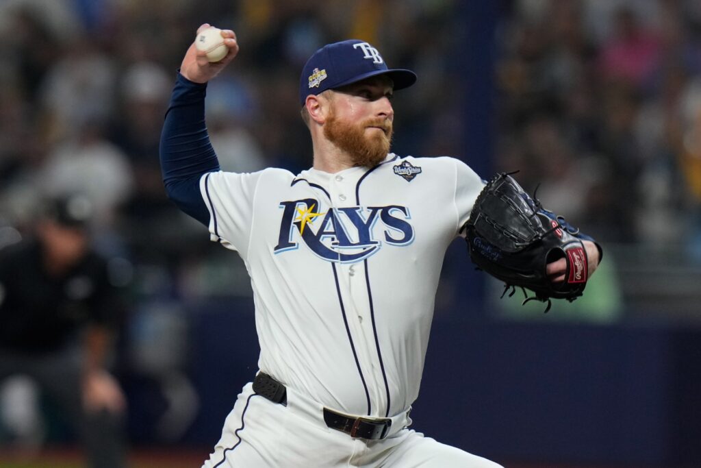 Tampa Bay Rays starting pitcher Drew Rasmussen throws to the...