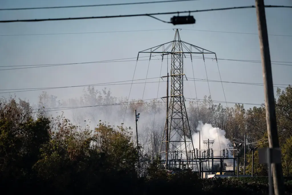 A plume of smokes rises from MC Tank Transport Inc.