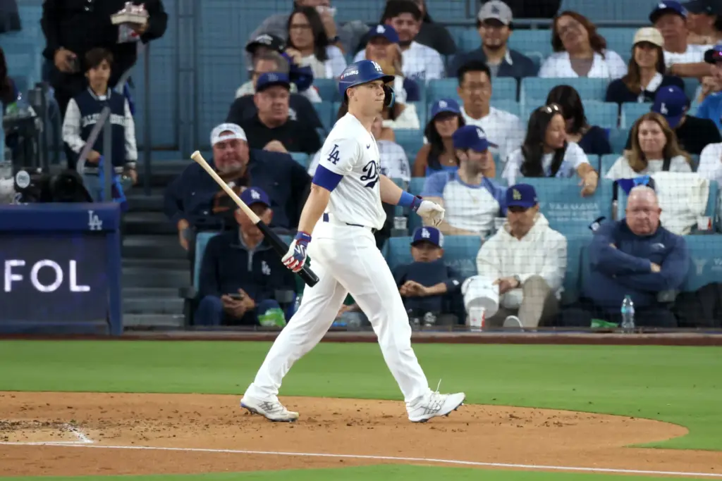 The Dodgers’ Will Smith walks back to the dugout after...