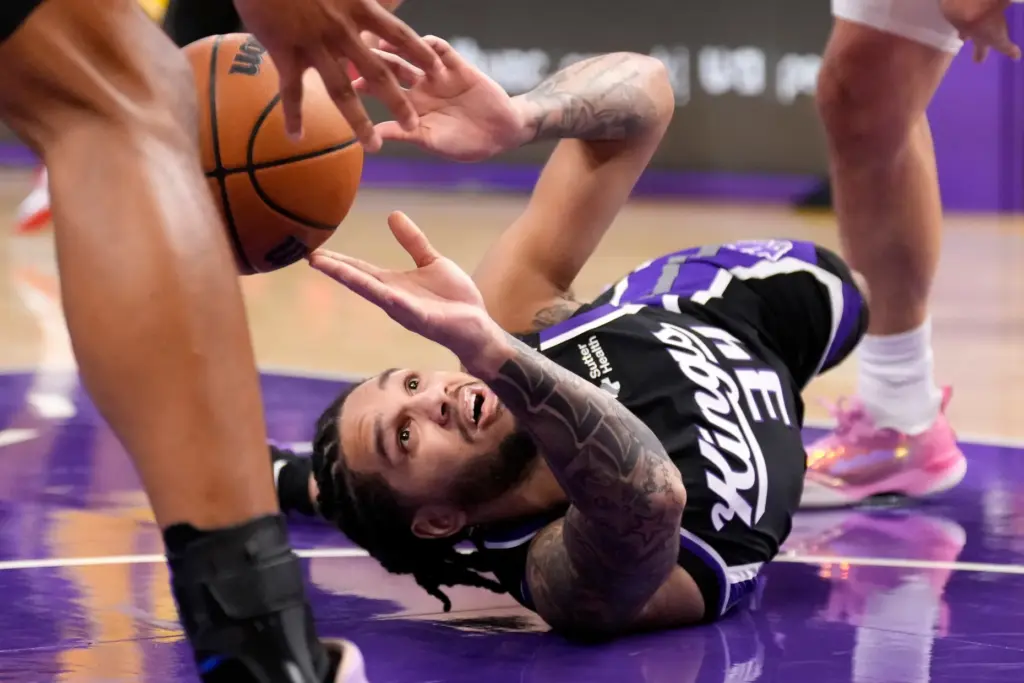 Sacramento Kings guard Emanuel Sharp passes the ball from the...