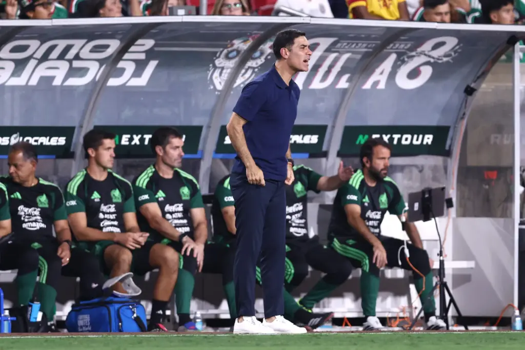 Mexico head coach Rafael Marquez, center, reacts on the sideline...