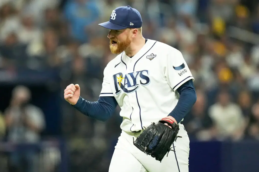 Tampa Bay Rays starting pitcher Drew Rasmussen celebrates during the...