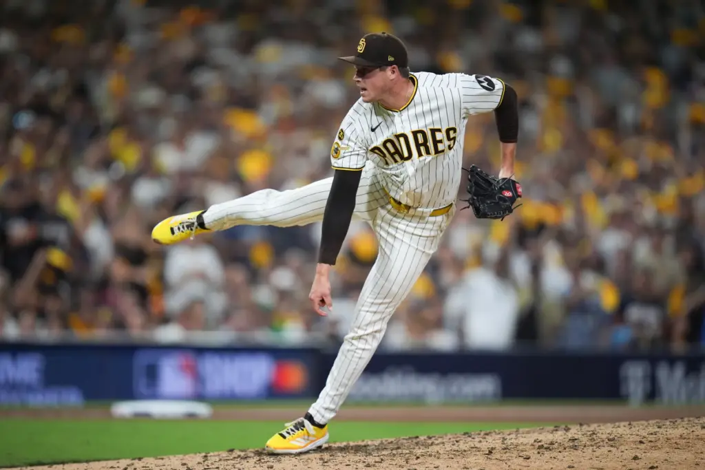 San Diego Padres relief pitcher Mason Miller throws to the...