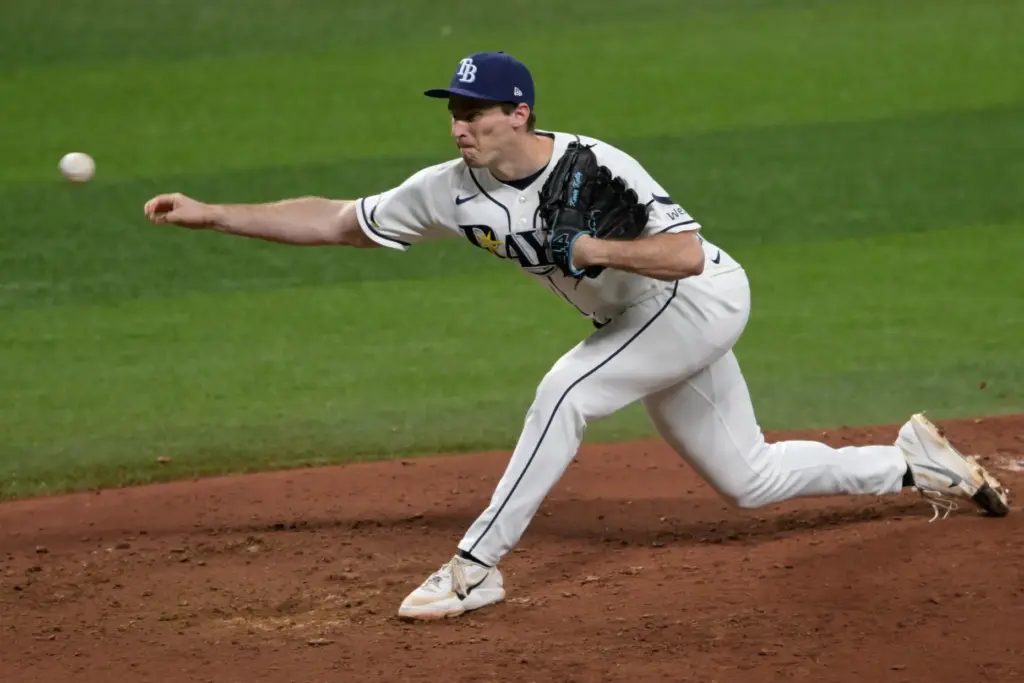 Tampa Bay Rays relief pitcher Kevin Kelly throws to the...