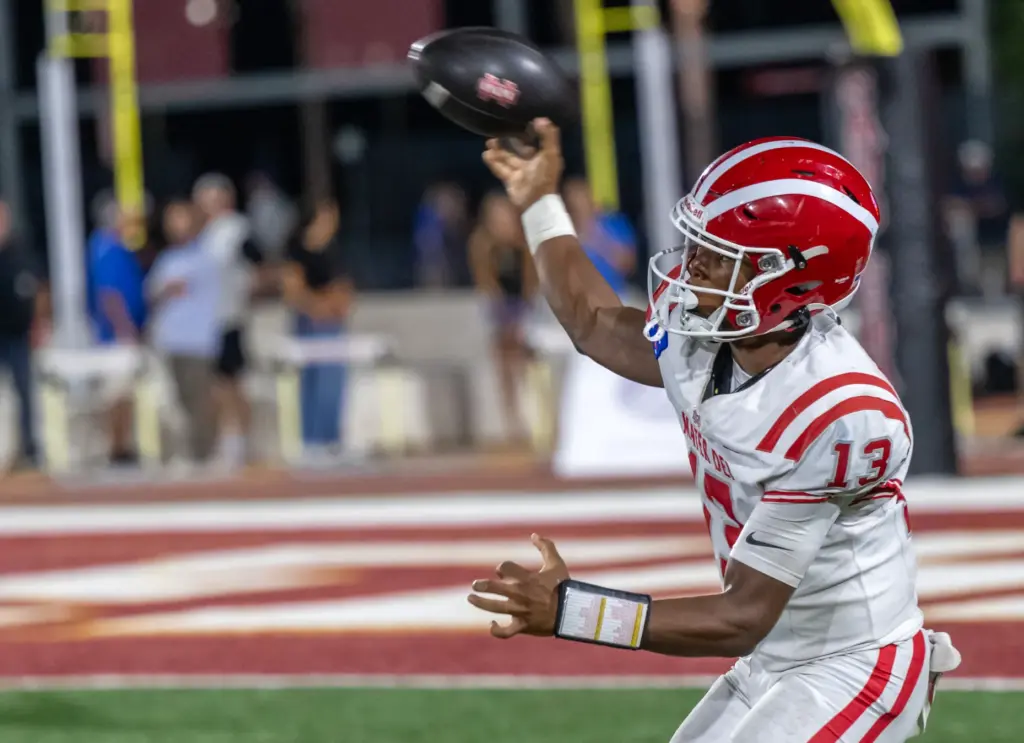 Mater Dei quarterback Paytyn Guess (13) throws the ball during...