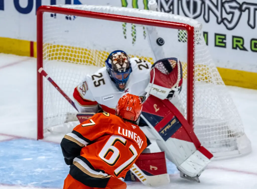 The Ducksâ Tristan Luneau (67) shoots on goal during the...