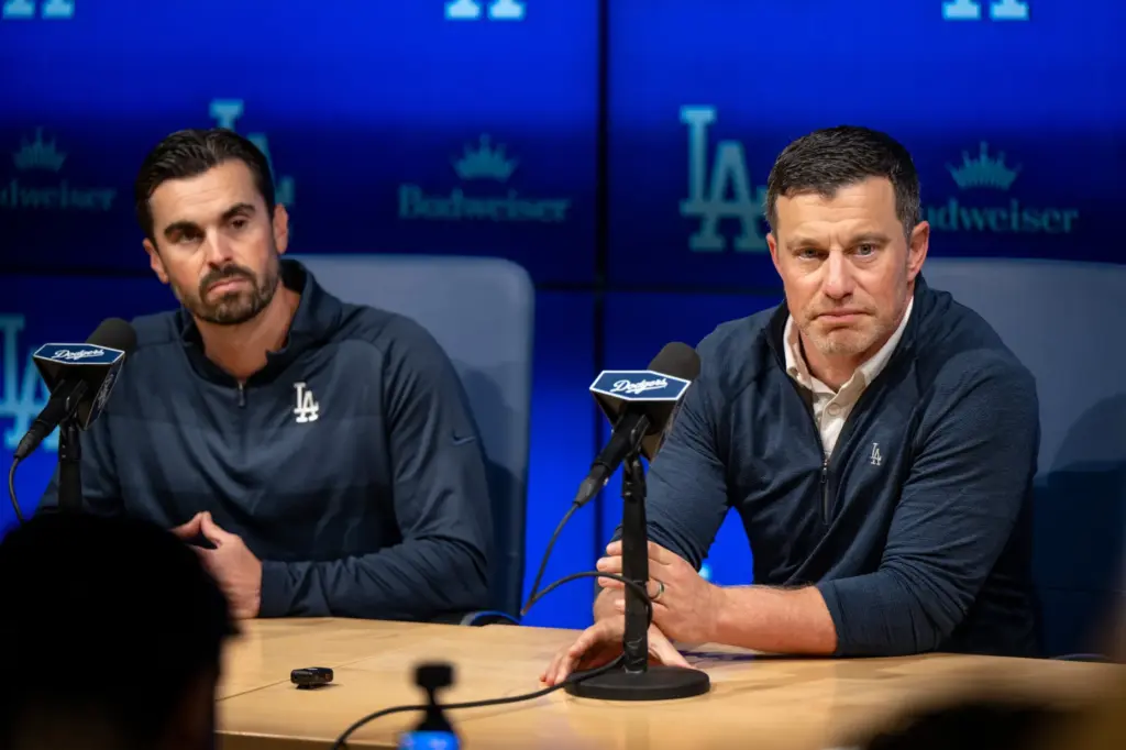 Dodgers president of baseball operations Andrew Friedman, right, and Dodgers...