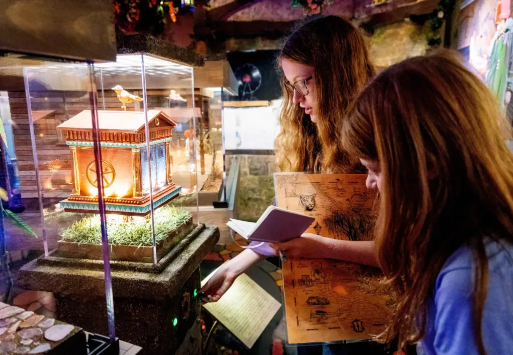 Selah Davis, 17, and her sister Nava Davis, 12, explore...