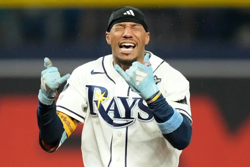 The Tampa Bay Rays’ Chandler Simpson celebrates after hitting a...