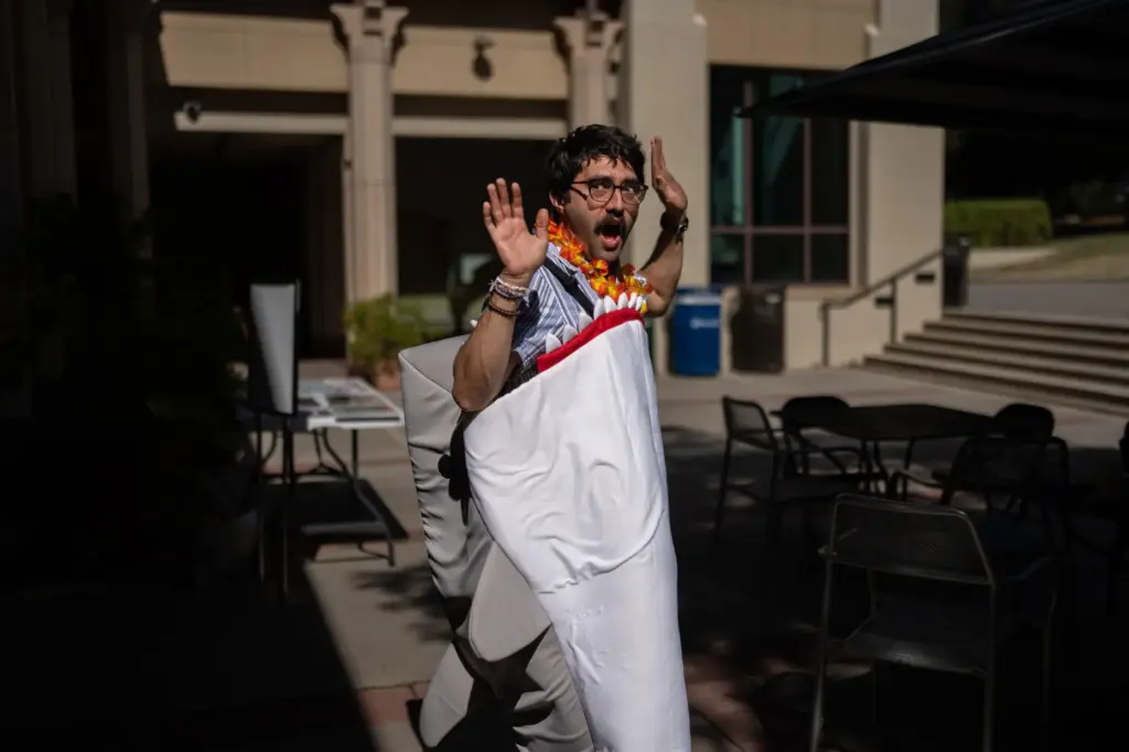 Braddock Sandoval, a chemistry professor at Occidental College, poses for...