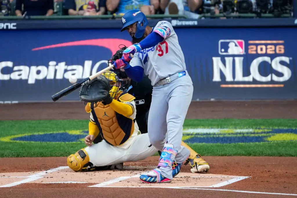 The Dodgers’ Teoscar HernÃ¡ndez drives in a run with a...