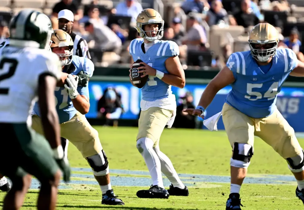 UCLA quarterback Ty Dieffenbach (14) prepares to throw a pass...