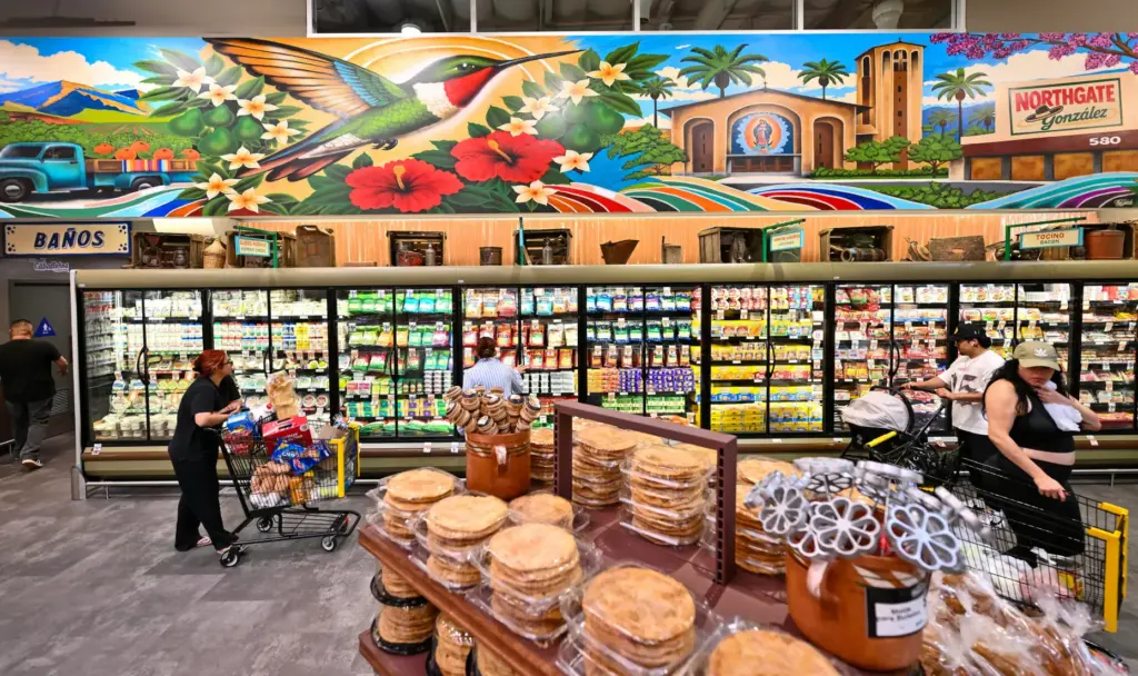 A mural by artist Kris Aguilar hangs over the dairy...