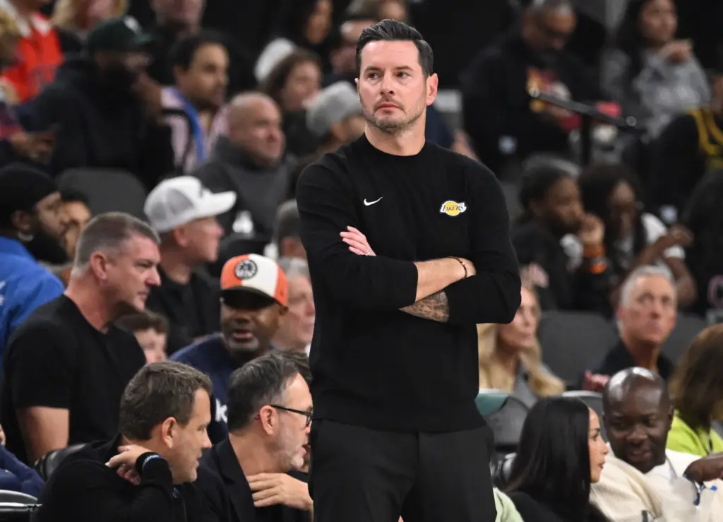Lakers head coach JJ Redick looks on from the sideline...
