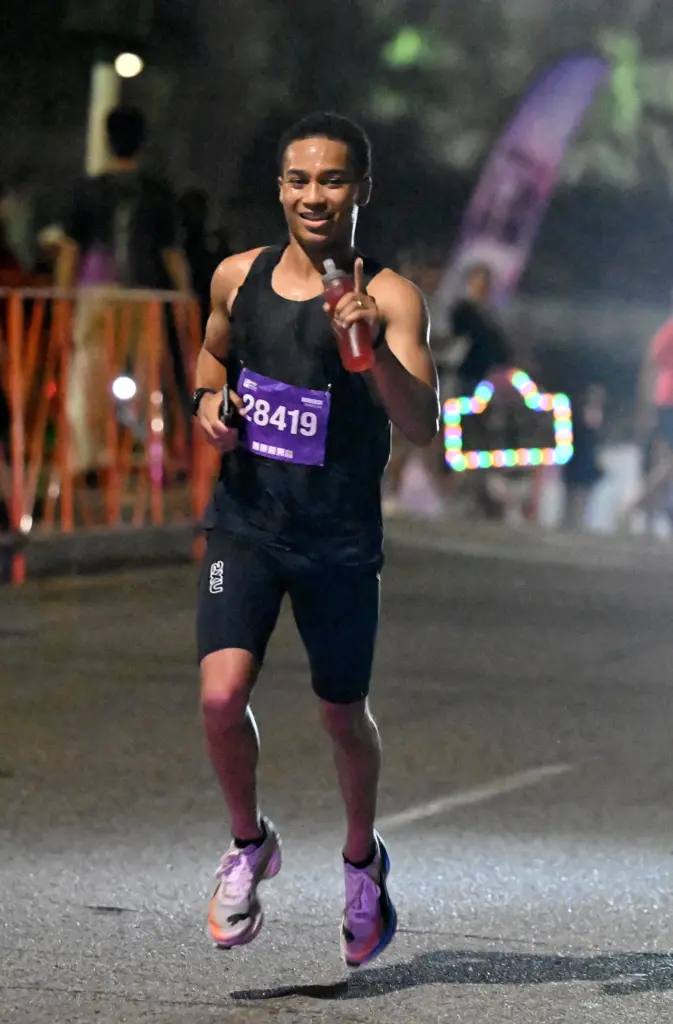 Xavier Smith leads early in the race on his way...